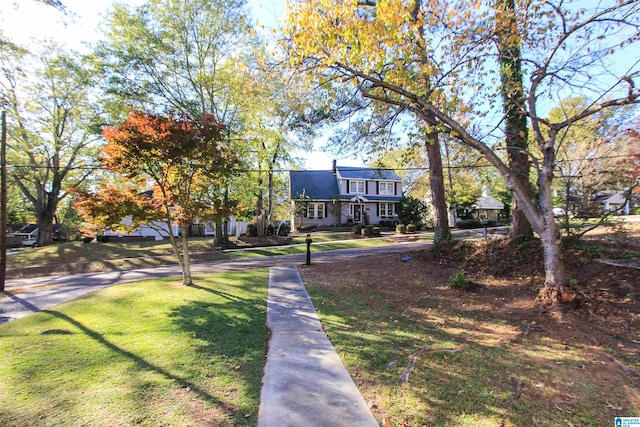 view of front of property with a front lawn