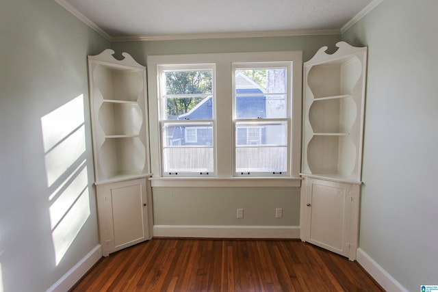 unfurnished room with dark hardwood / wood-style floors and ornamental molding