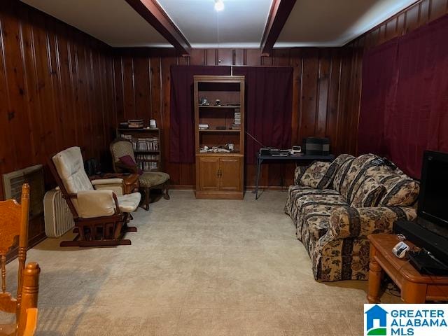 interior space with beamed ceiling and wood walls