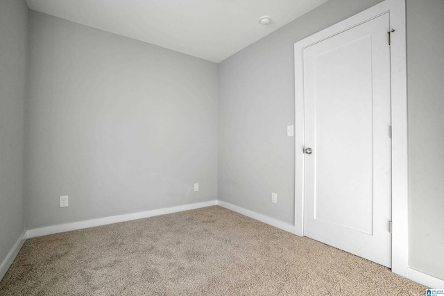 unfurnished room with carpet flooring