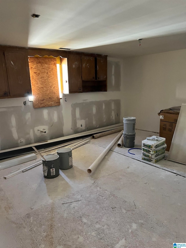 kitchen with dark brown cabinetry