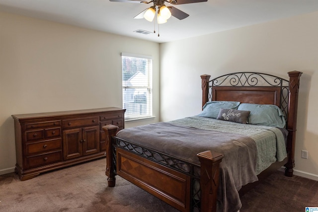 bedroom with ceiling fan and carpet floors