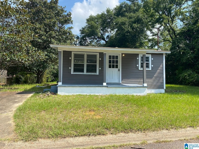 view of front of home featuring a front lawn and a porch