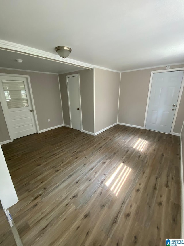 interior space with dark hardwood / wood-style floors