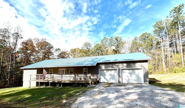 ranch-style house with a front lawn and a garage