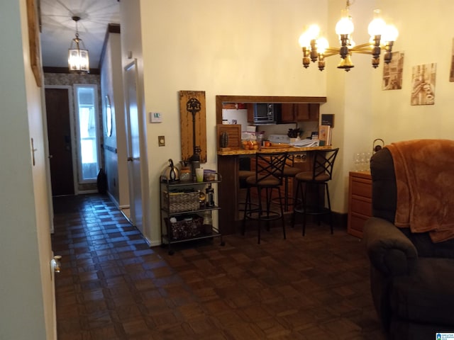 foyer entrance featuring a chandelier