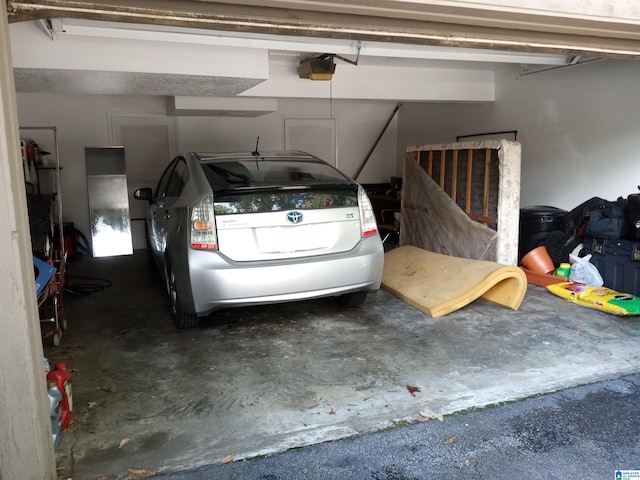 garage featuring a garage door opener