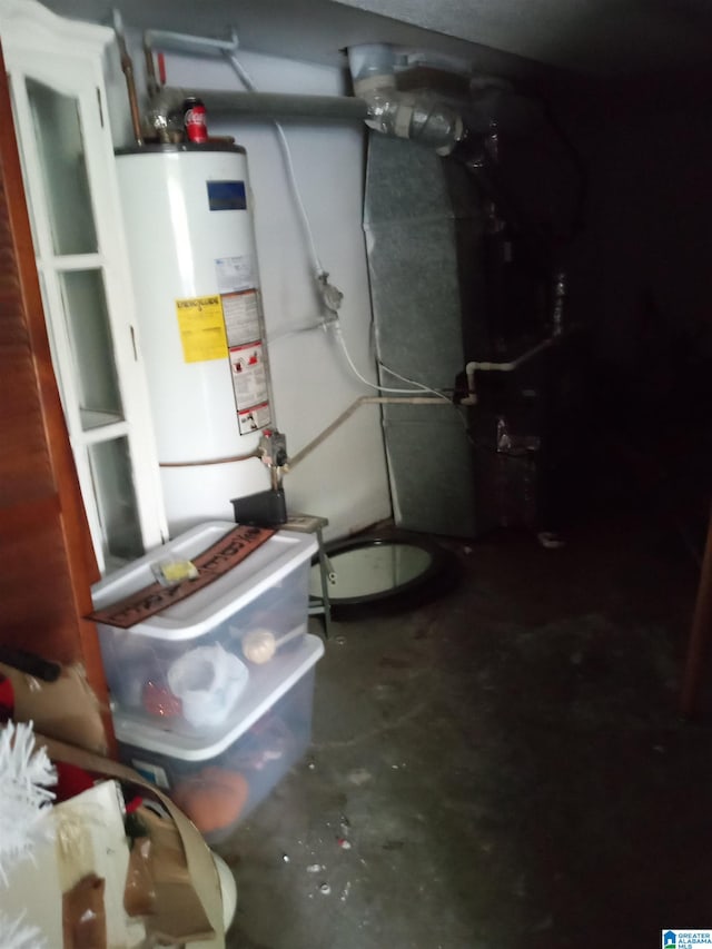 utility room with gas water heater