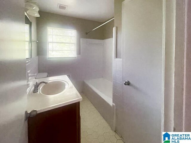 bathroom featuring vanity and tile patterned floors