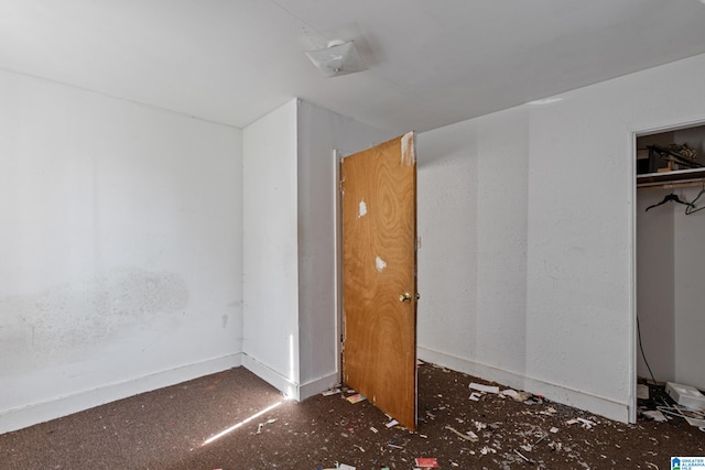 unfurnished bedroom featuring a closet