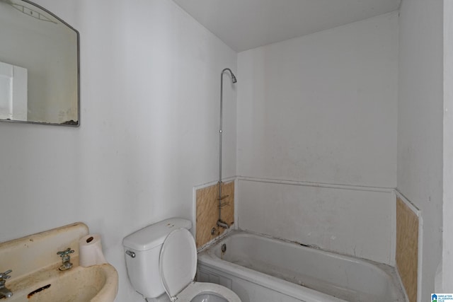 full bathroom featuring shower / bath combination, toilet, and sink