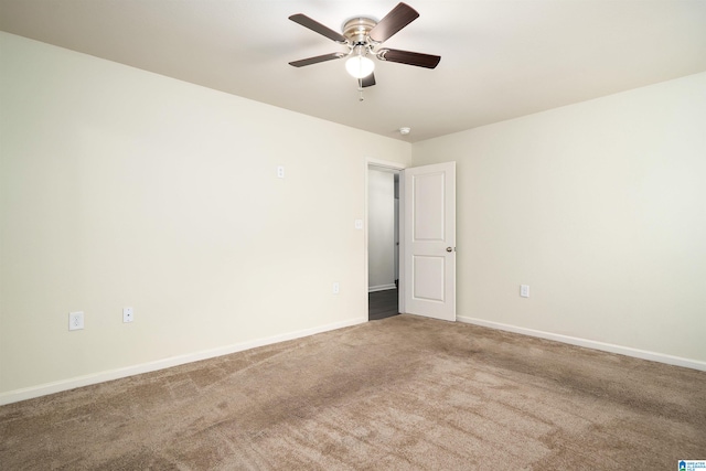 unfurnished room with carpet and ceiling fan