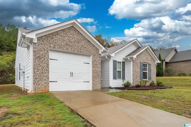 view of front facade featuring a front yard and a garage