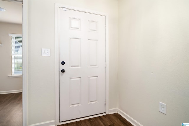 doorway to outside featuring dark hardwood / wood-style floors