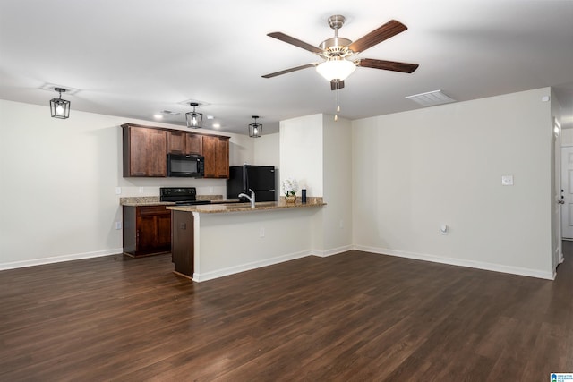 kitchen featuring kitchen peninsula, light stone counters, ceiling fan, black appliances, and dark hardwood / wood-style floors