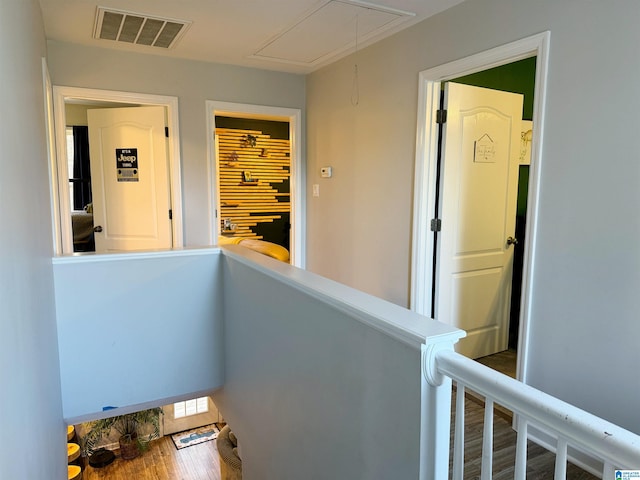 hall featuring wood-type flooring