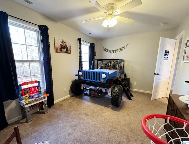 bedroom featuring ceiling fan and carpet floors