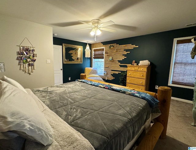 carpeted bedroom with ceiling fan