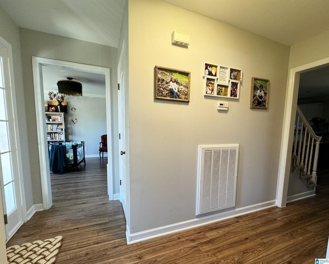 hall with dark wood-type flooring