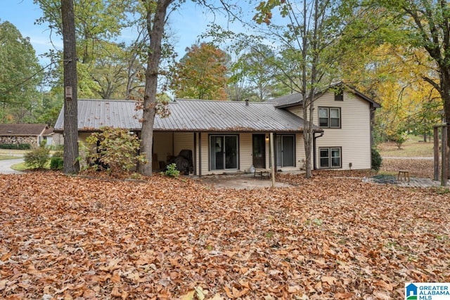 rear view of house featuring a patio area