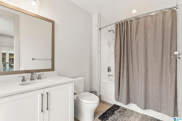 full bathroom featuring tile patterned floors, vanity, toilet, and shower / bathtub combination with curtain