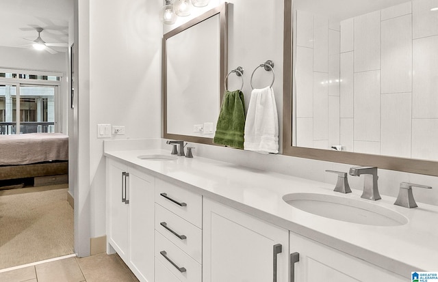 bathroom featuring tile patterned floors and vanity