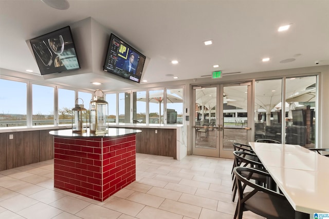 kitchen featuring french doors and a center island