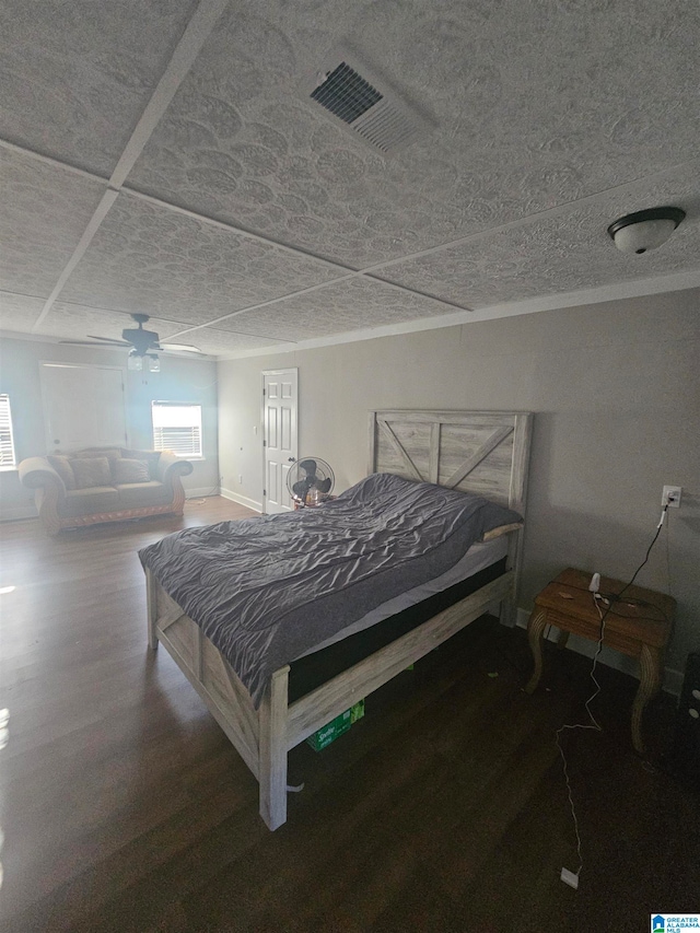 bedroom featuring wood-type flooring