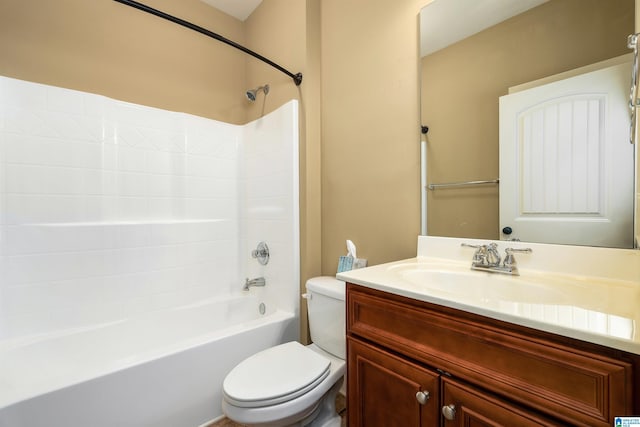 full bathroom featuring vanity,  shower combination, and toilet