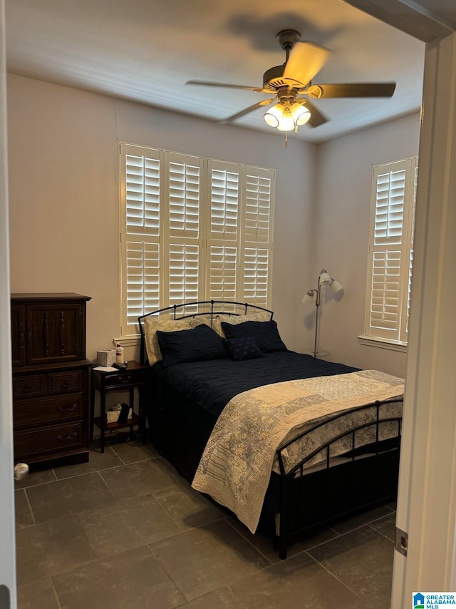 bedroom featuring ceiling fan