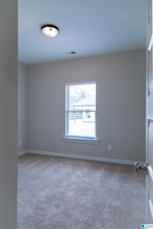 view of carpeted spare room