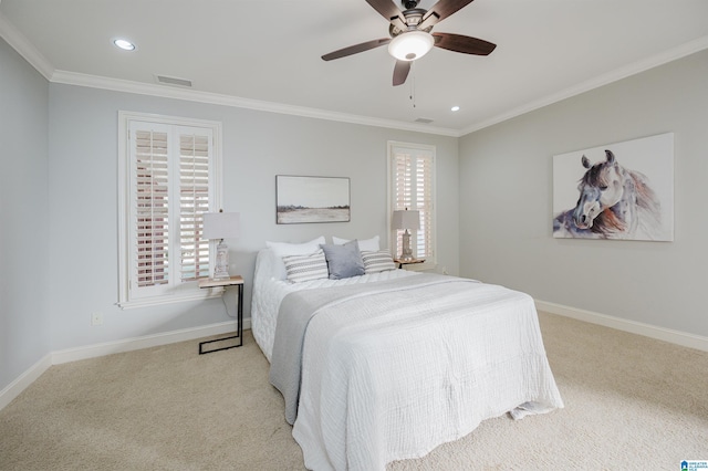 bedroom featuring light carpet, ceiling fan, and ornamental molding