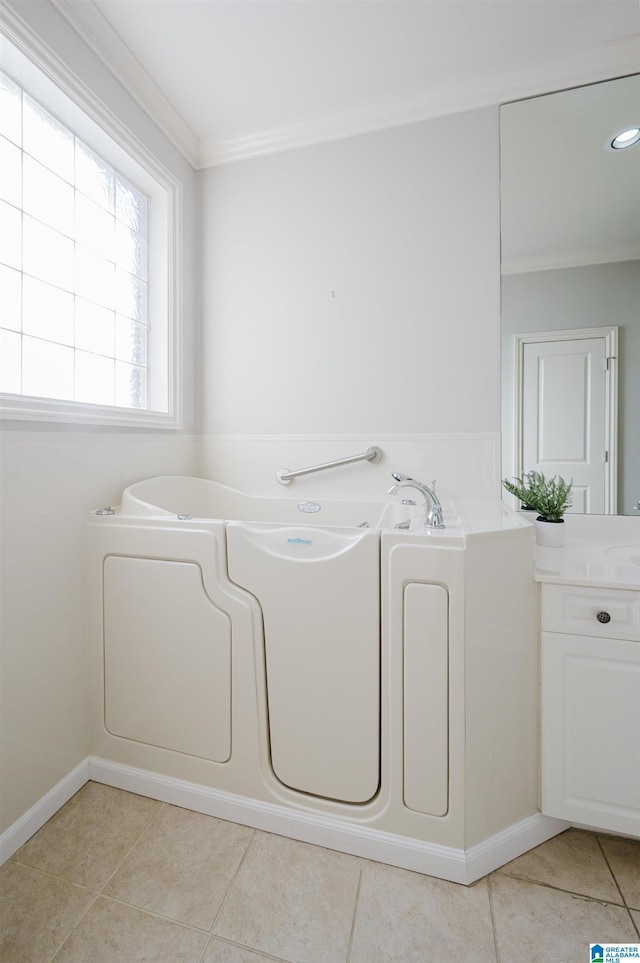 washroom featuring crown molding and light tile patterned floors