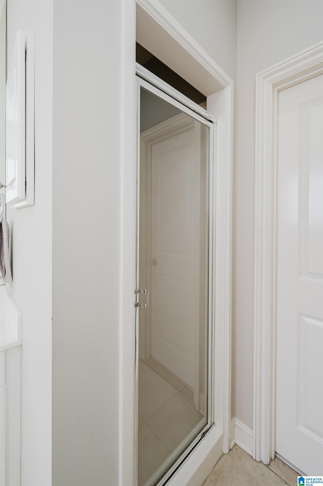 bathroom with an enclosed shower