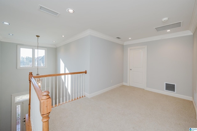 unfurnished room with light carpet and ornamental molding