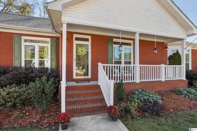 entrance to property with a porch