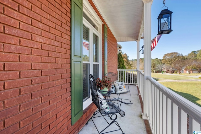 balcony featuring covered porch