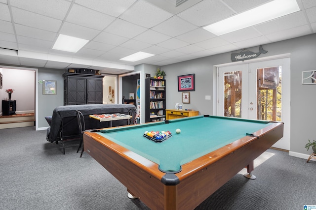 game room with a paneled ceiling, dark carpet, billiards, and french doors