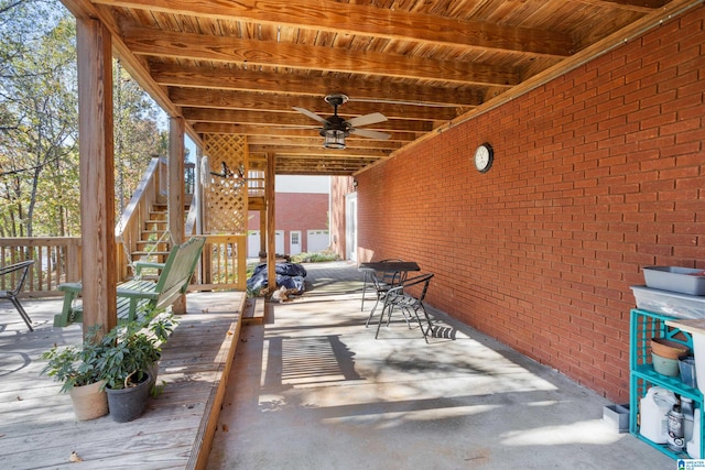 view of patio featuring ceiling fan