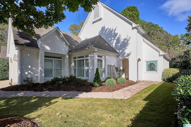 exterior space featuring a front lawn