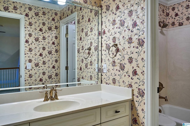 full bathroom with tub / shower combination, vanity, toilet, and crown molding