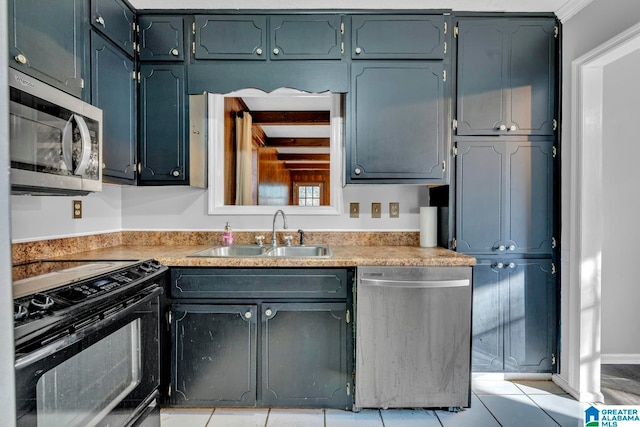 kitchen featuring light tile patterned flooring, stainless steel appliances, ornamental molding, and sink