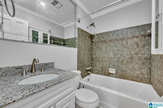 full bathroom featuring ornamental molding, a textured ceiling, vanity, toilet, and tiled shower / bath