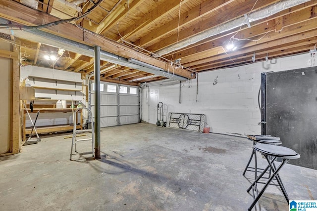 garage featuring black refrigerator