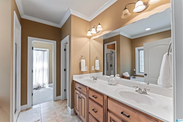 bathroom featuring crown molding, tile patterned floors, vanity, and plenty of natural light