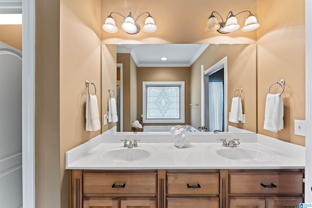 bathroom featuring vanity and ornamental molding