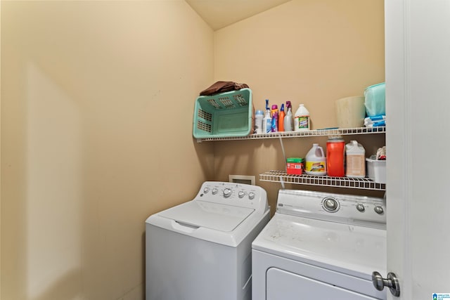 laundry area with washer and clothes dryer