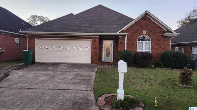 view of front facade featuring a front lawn and a garage