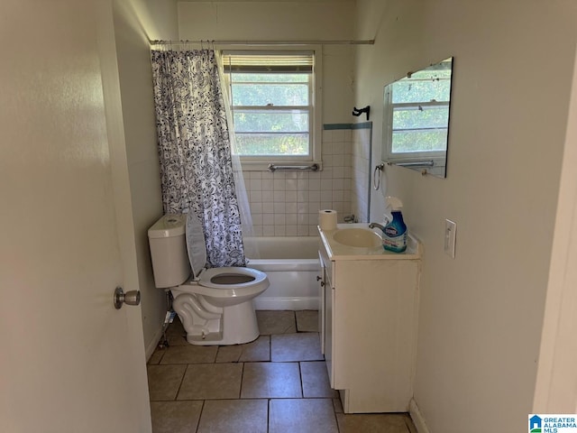 full bathroom featuring shower / bathtub combination with curtain, tile patterned flooring, vanity, and toilet