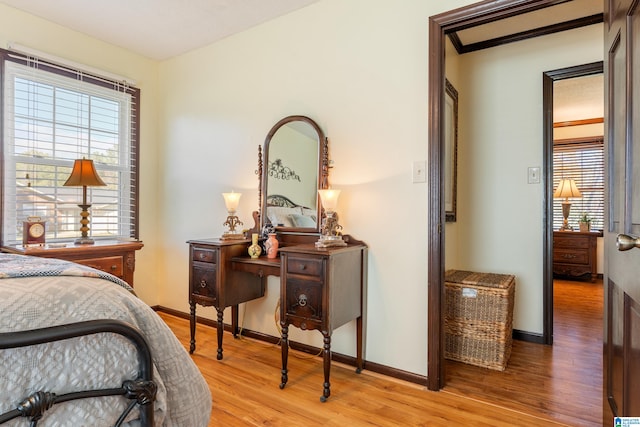 bedroom with light hardwood / wood-style flooring